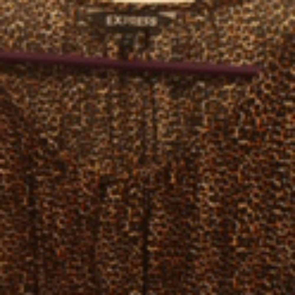 Women's Leopard print top with black ribbon